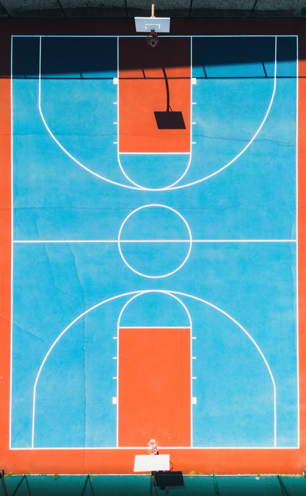 Outdoor basketball court with hoop
